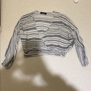 Akira butterfly arm low cut blouse